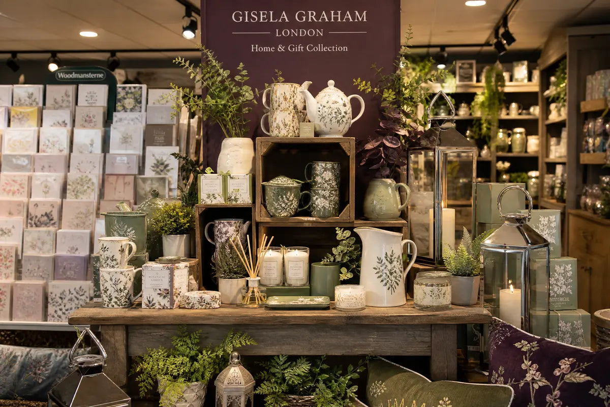 Gisela Graham gifts and homeware display on wooden shelves at Pengelly Garden Centre, Cornwall