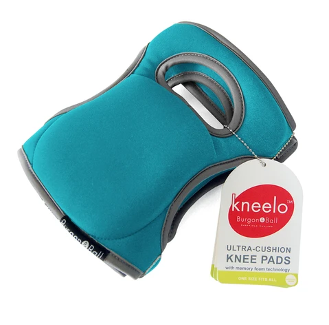 Pair of cushioned gardening knee pads with eucalyptus green fabric covers and adjustable straps
