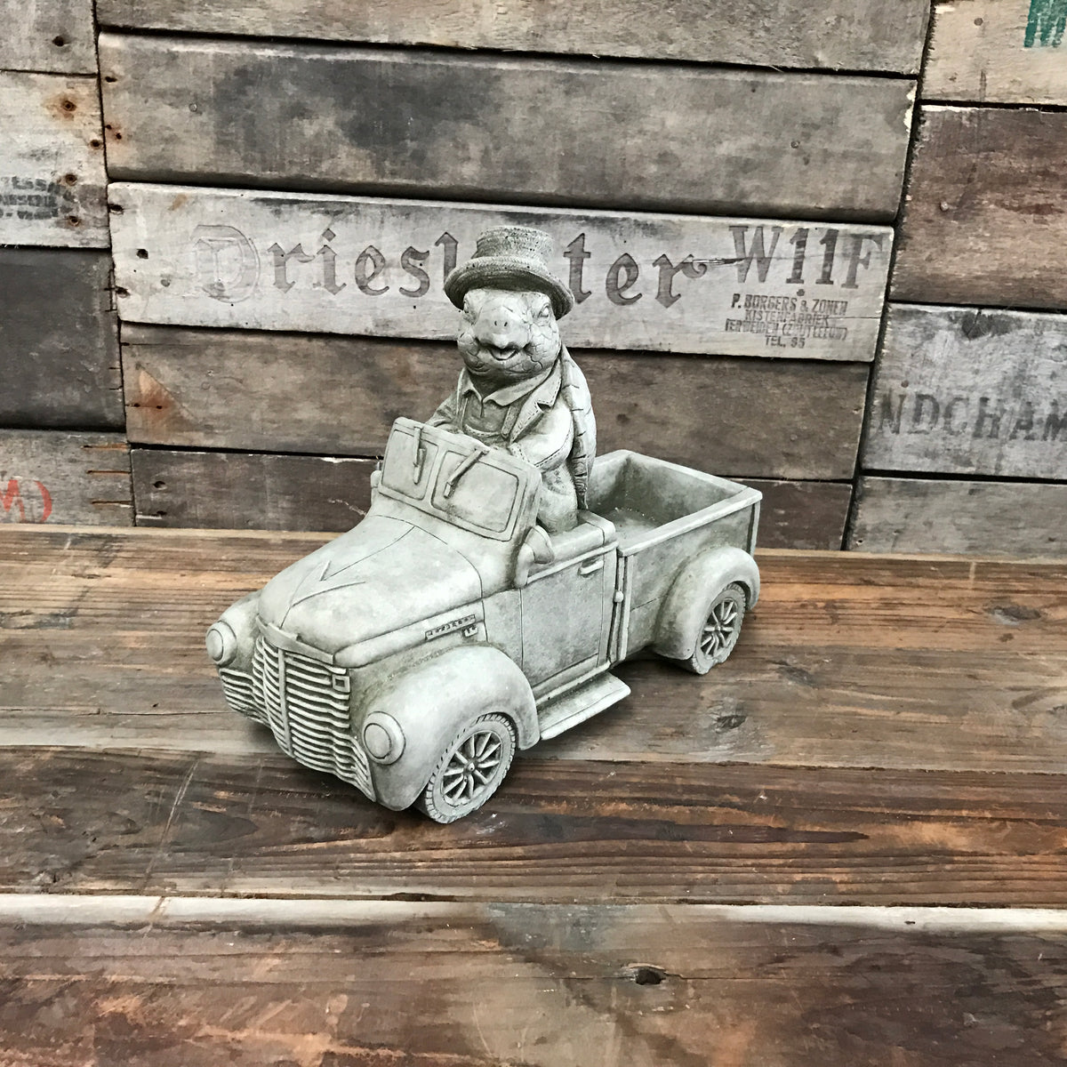Customer car parked in Pengelly Garden Centre car park beside outdoor plant displays