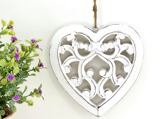 chunky knitted heart cushion with large stitches, cosy decorative gift cushion for home or conservatory