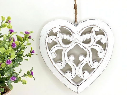 chunky knitted heart cushion with large stitches, cosy decorative gift cushion for home or conservatory