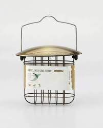 Round metal suet cake feeder with wire mesh and hanging hook for garden birds
