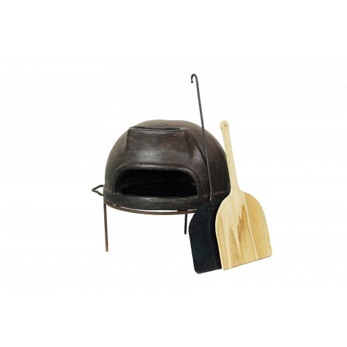 Outdoor wood-fired pizza oven with stone dome and chimney on metal stand, ideal for garden patio cooking