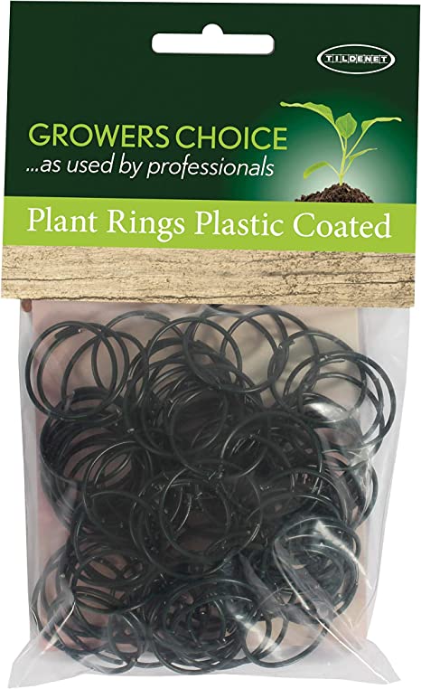Black plastic planter rings to protect young plants and create neat planting edges