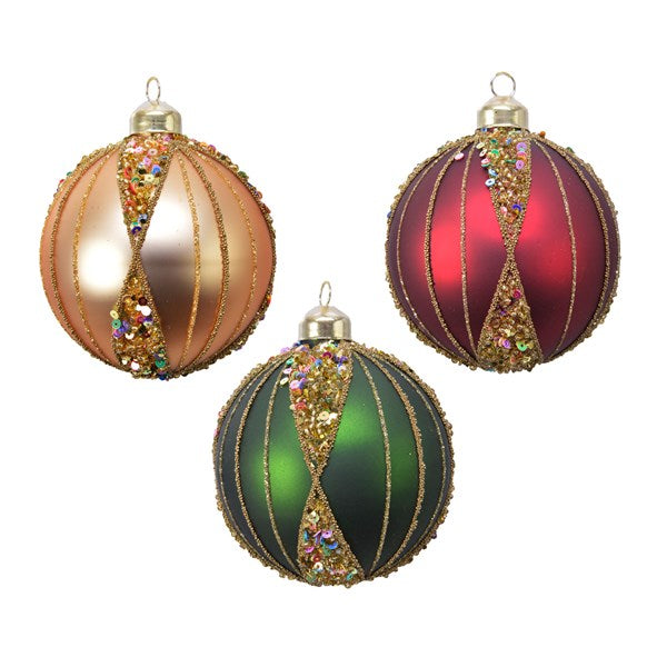 Shimmering copper sequin decorative garden ornament ball on dark background for patio or indoor display